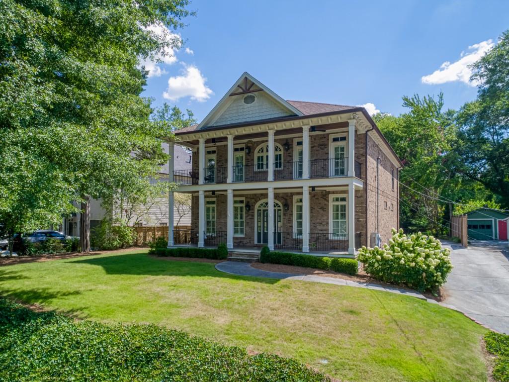 1363 Sylvan Circle Northeast Brookhaven, GA 30319 - Photo 8 of 56 a front view of a house with a yard