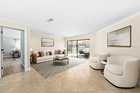 a living room with furniture and a couch