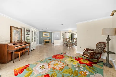 a room with furniture and a rug