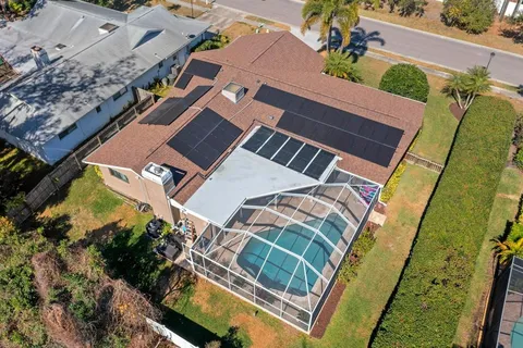 an aerial view of a house having yard