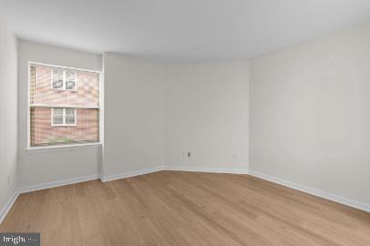 960 Fell Street, Unit 402 Baltimore, MD 21231 - Photo 11 of 18 an empty room with a window