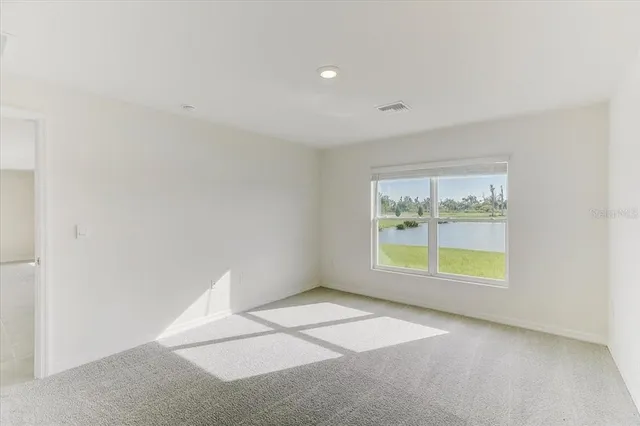 an empty room with windows