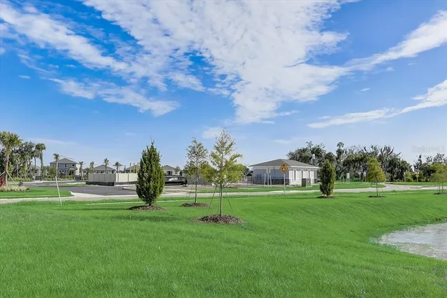 a view of a park with swings and slides