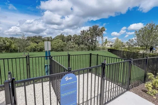 a view of a balcony with a forest