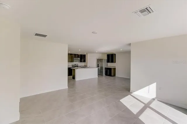 a view of kitchen with wooden floor