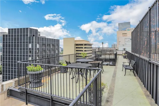 a view of buildings from a balcony