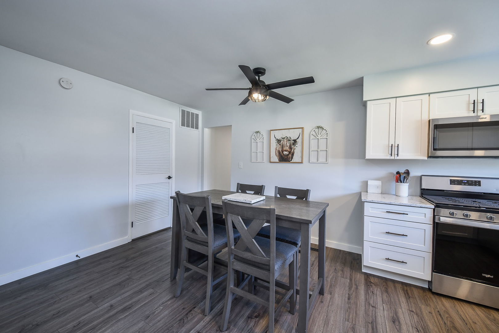 327 South Jackson Street Batavia, IL 60510 - Photo 5 of 14 a view of a dining room with furniture and wooden floor