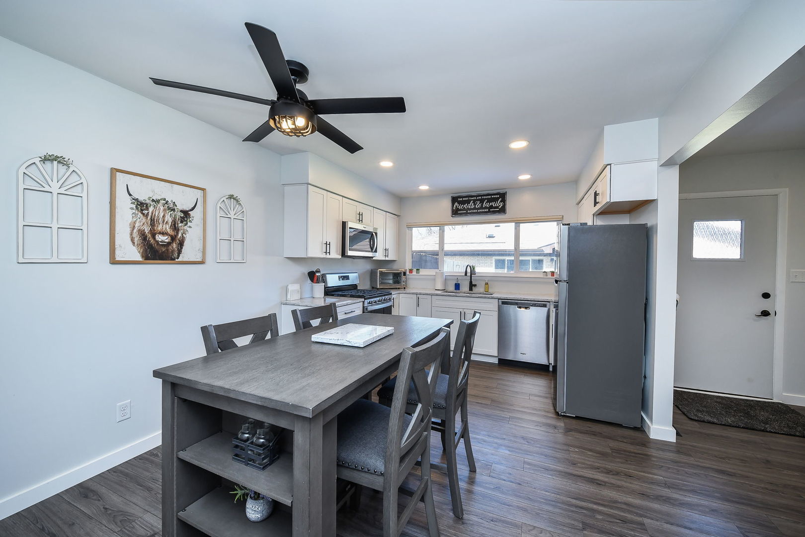 327 South Jackson Street Batavia, IL 60510 - Photo 6 of 14 a kitchen with a table chairs and refrigerator