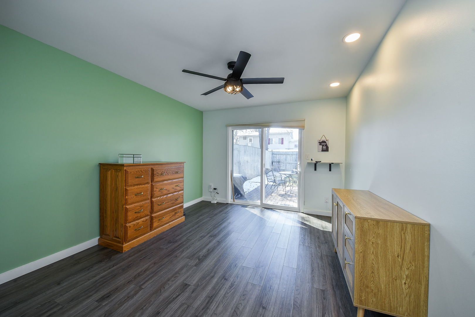 327 South Jackson Street Batavia, IL 60510 - Photo 10 of 14 wooden floor in an empty room with a window