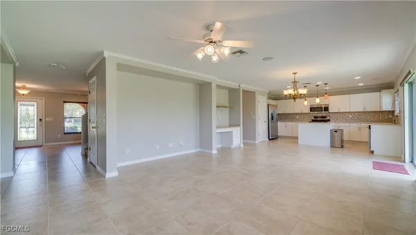a view of a kitchen with a sink and an cabinet