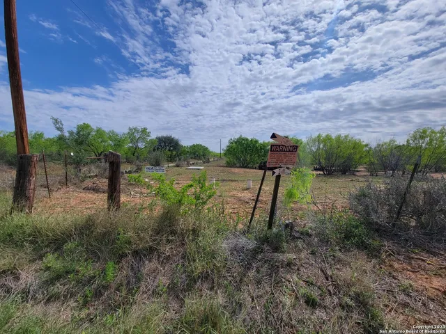 a view of street from a yard