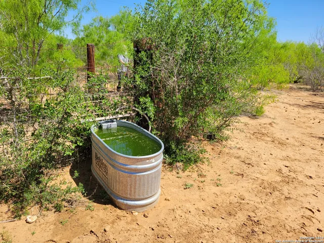 a view of a lake with a big yard