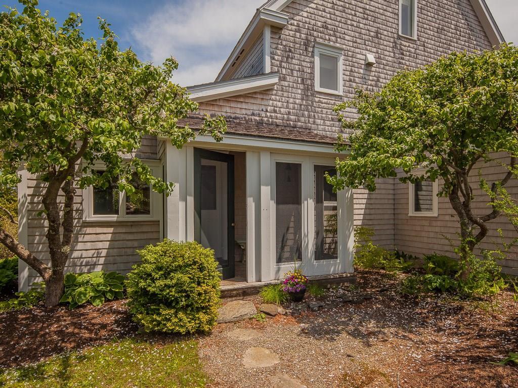 516 Port Clyde Road Tenants Harbor, ME 04860 - Photo 2 of 15 The welcoming front entrance framed...