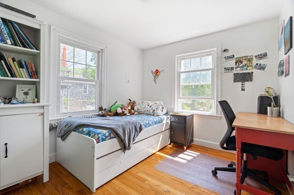 11 Sunset Road Arlington, MA 02474 - Photo 16 of 27 a bedroom with a bed and a window