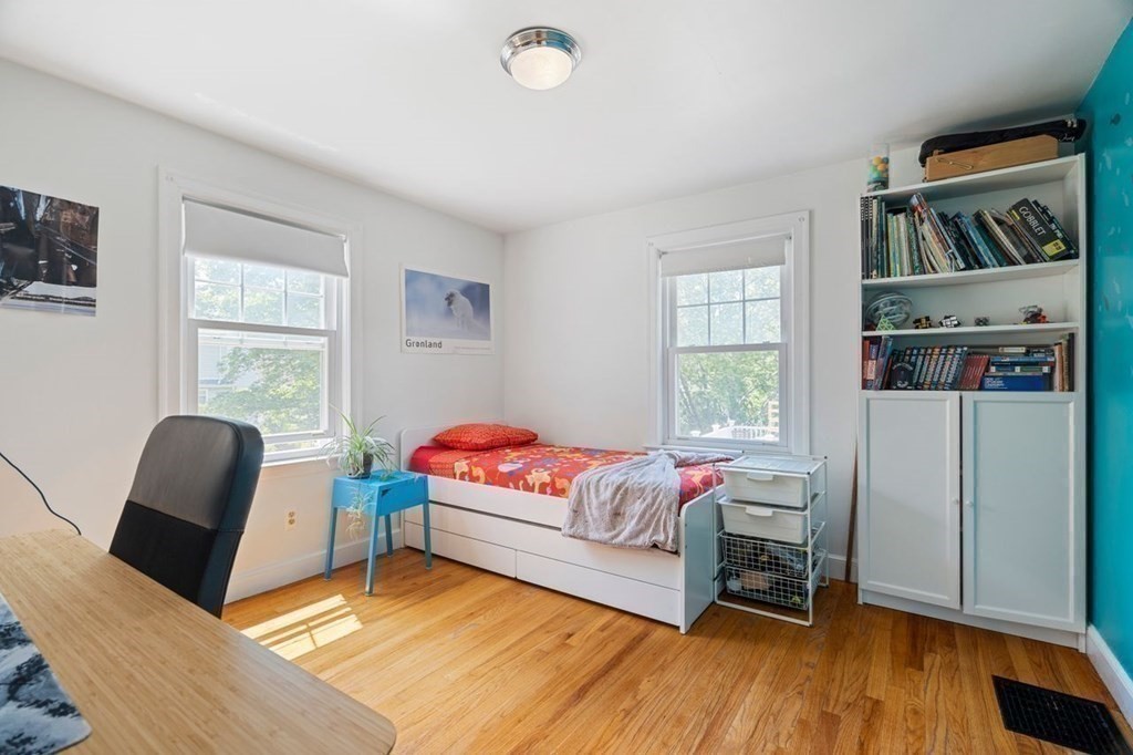 11 Sunset Road Arlington, MA 02474 - Photo 18 of 27 a living room with furniture and a window