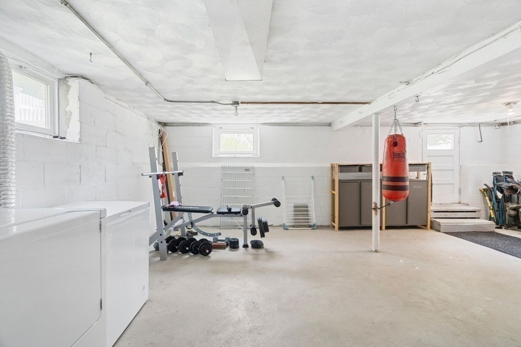 11 Sunset Road Arlington, MA 02474 - Photo 22 of 27 a view of a room with gym equipment