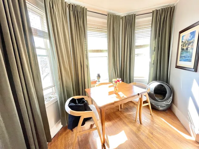 a kitchen with a sink and a toilet