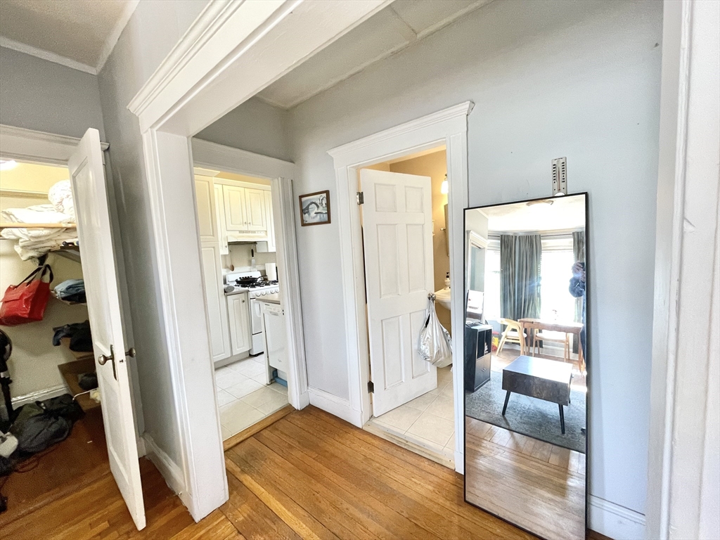 131 Park Drive, Unit 25 Boston, MA 02215 - Photo 13 of 13 a view of a livingroom with wooden floor and furniture