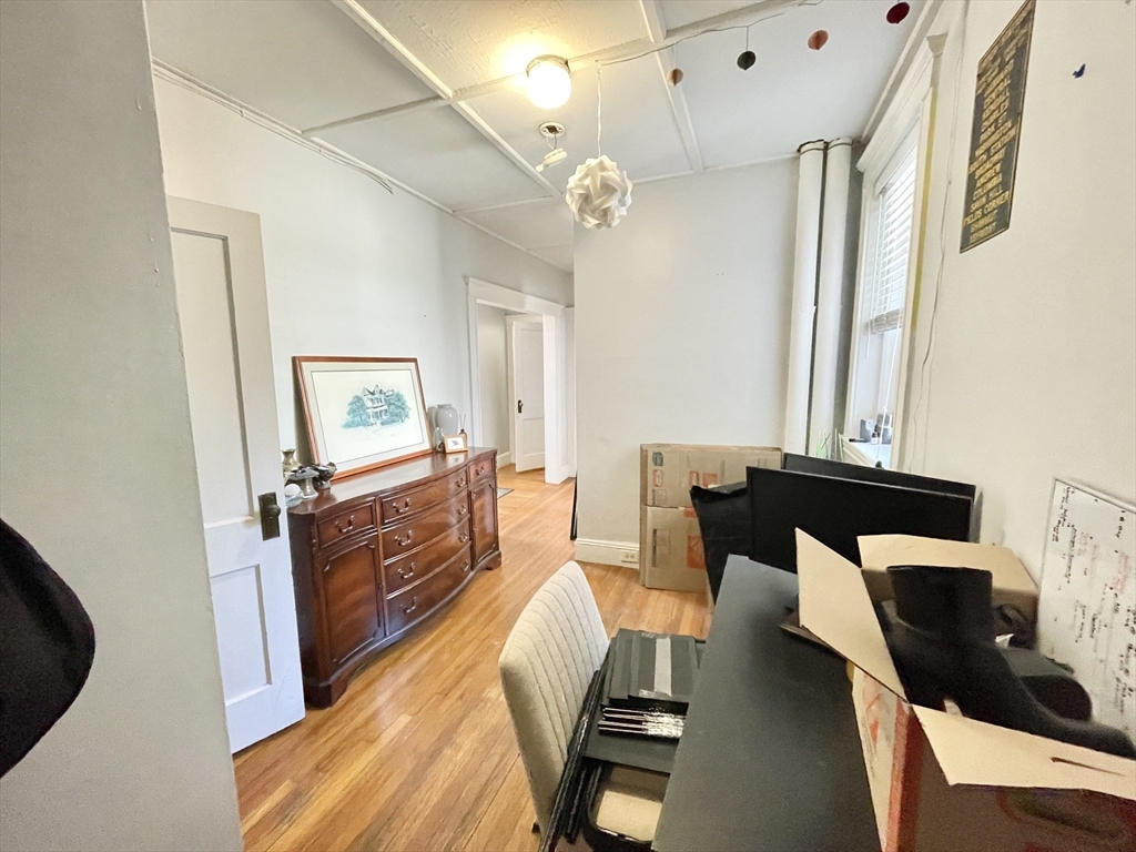 131 Park Drive, Unit 25 Boston, MA 02215 - Photo 2 of 13 a living room with furniture and a table