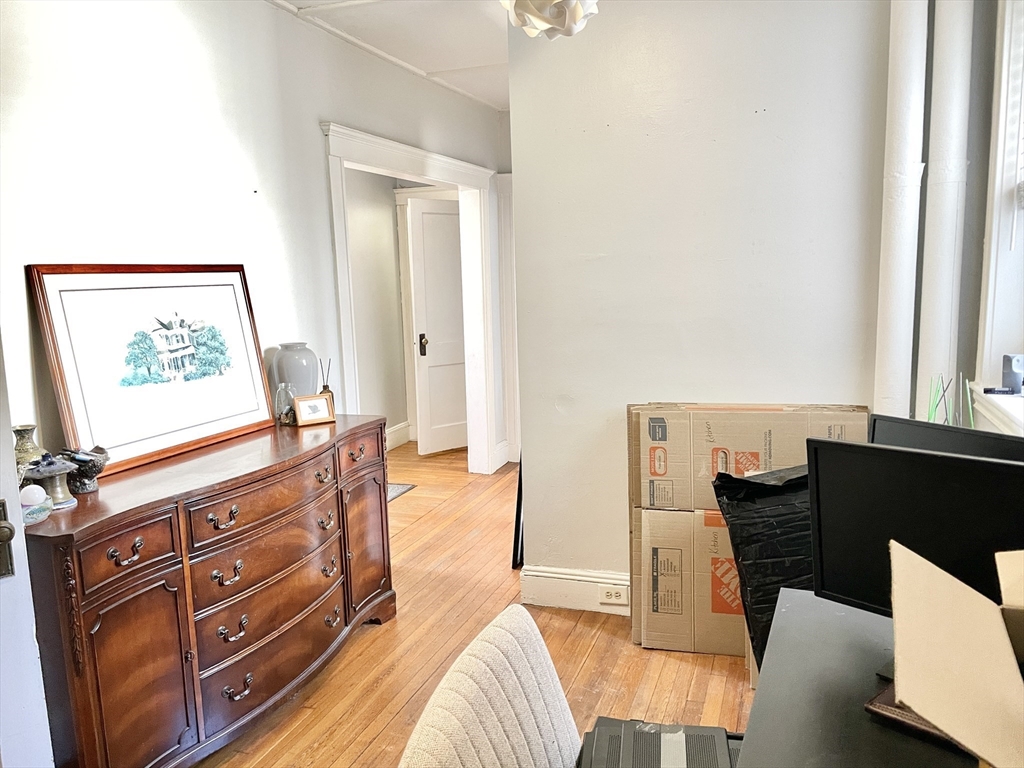 131 Park Drive, Unit 25 Boston, MA 02215 - Photo 9 of 13 a living room with furniture and a window