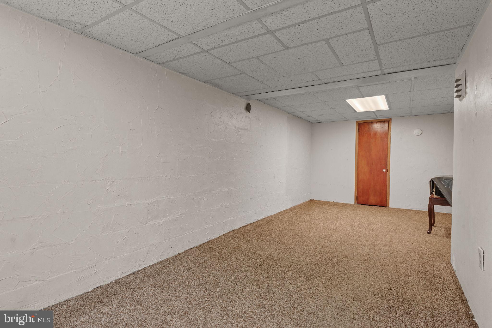 722 Union Street Lancaster, PA 17603 - Photo 22 of 35 a view of a livingroom with a ceiling fan and window