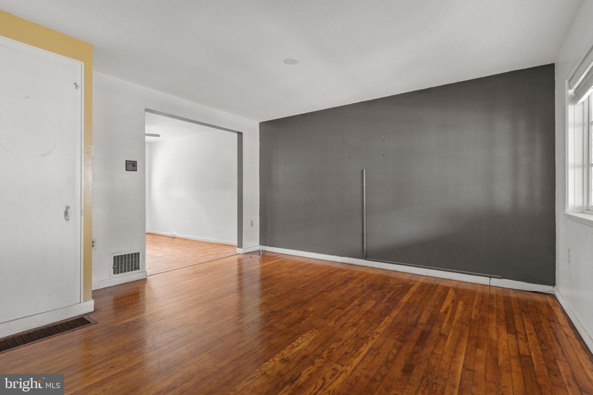 722 Union Street Lancaster, PA 17603 - Photo 6 of 35 a view of an empty room with wooden floor