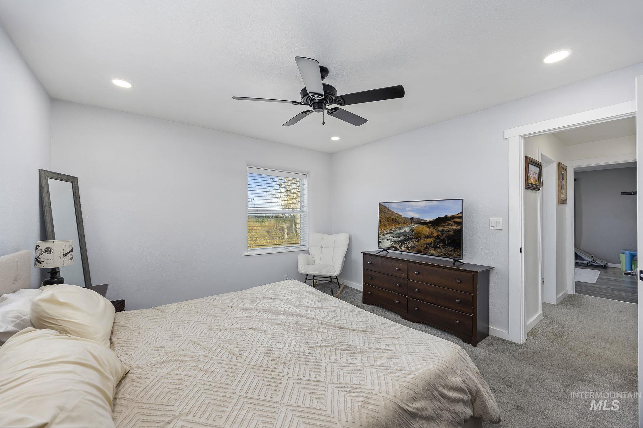 128 South 100 East Rupert, ID 83350 - Photo 17 of 44 Bedroom with carpet floors, recessed lighting, and a ceiling fan