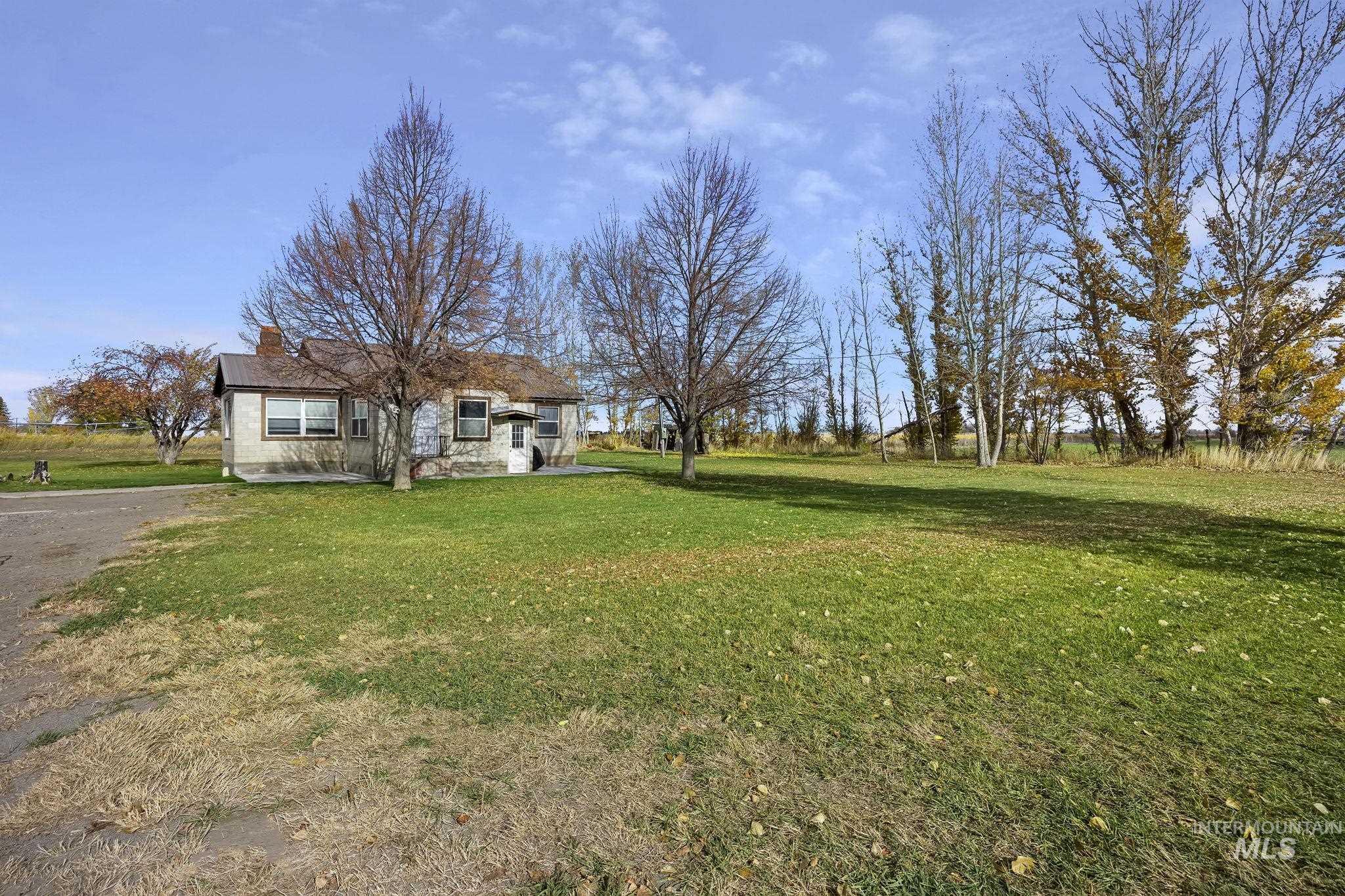 128 South 100 East Rupert, ID 83350 - Photo 2 of 44 View of green lawn