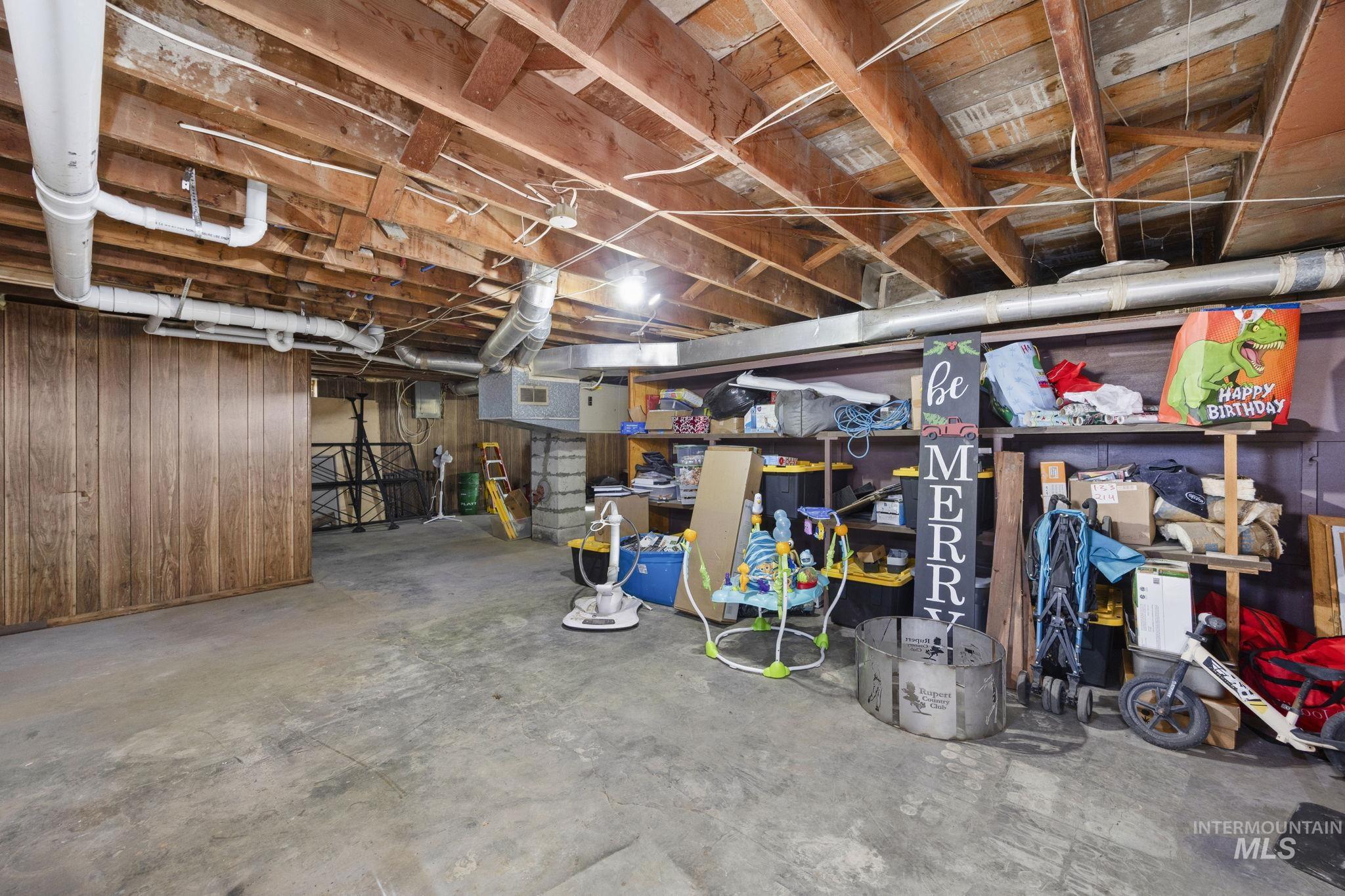 128 South 100 East Rupert, ID 83350 - Photo 29 of 44 Unfinished below grade area featuring wooden walls