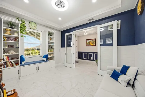 a large kitchen with stainless steel appliances lots of counter space and breakfast area