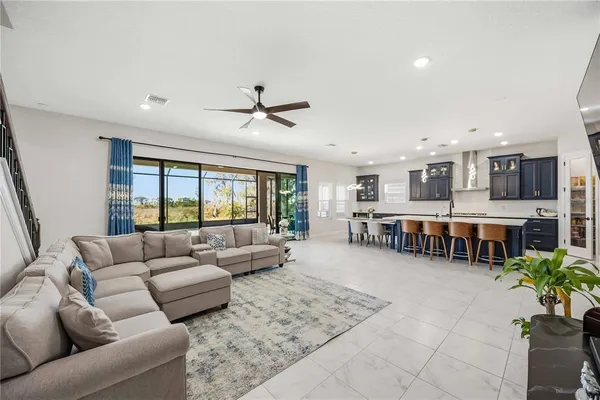 a room with a bed and a lamp on table