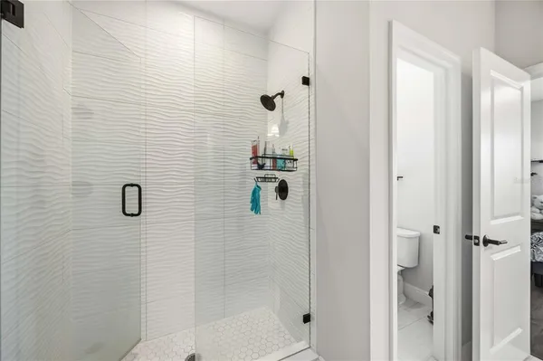 a view of a house with a yard porch and sitting area