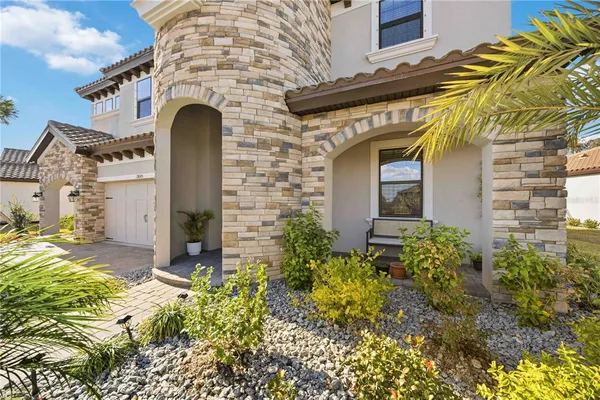 a view of a porch with a bench