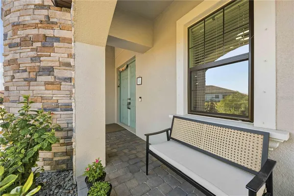 a view of livingroom with furniture and windows