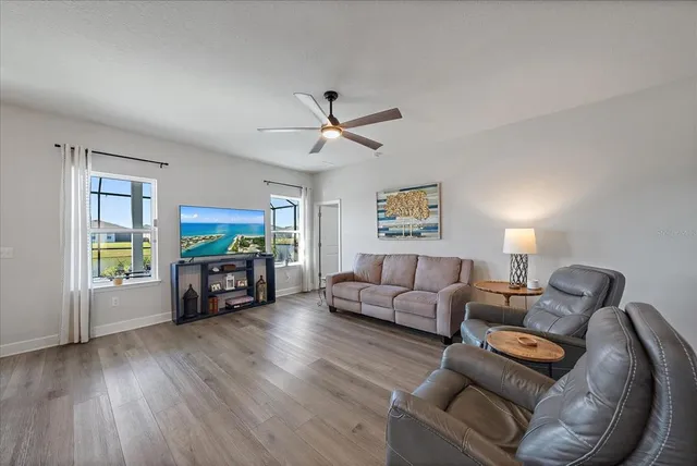 a bathroom with a shower sink and mirror