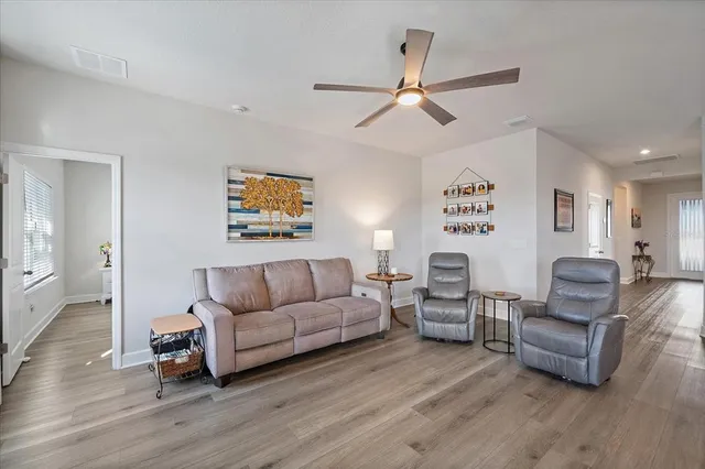 a bedroom with a bed and a dresser in it