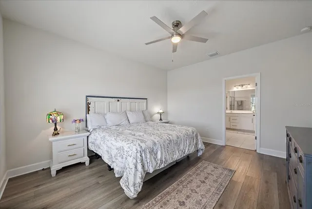 a view of living room with furniture and wooden floor