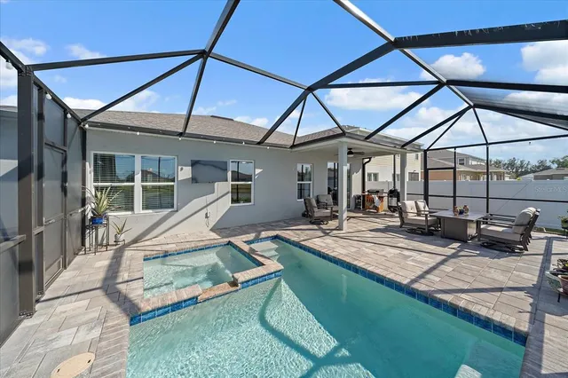 a view of a livingroom with furniture and a window