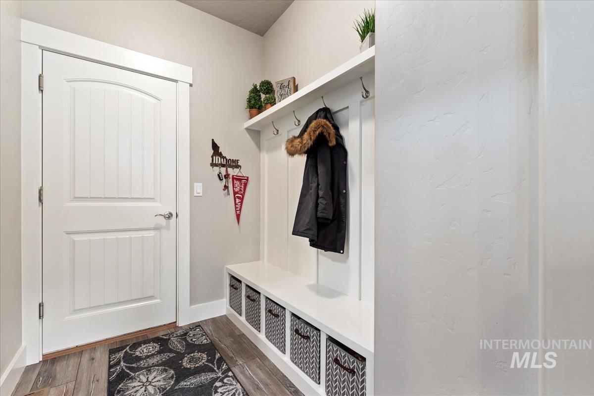 1447 West Arch Rock Street Meridian, ID 83646 - Photo 29 of 43 Mudroom with wood finished floors and baseboards