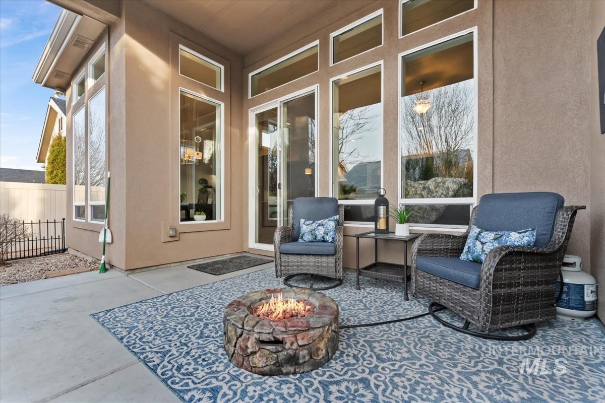 1447 West Arch Rock Street Meridian, ID 83646 - Photo 32 of 43 View of patio / terrace featuring an outdoor fire pit