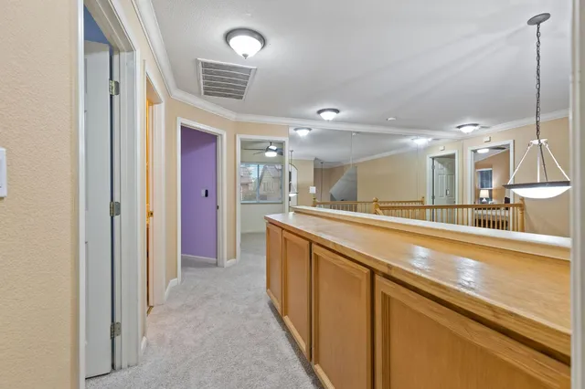 a bedroom with furniture and windows