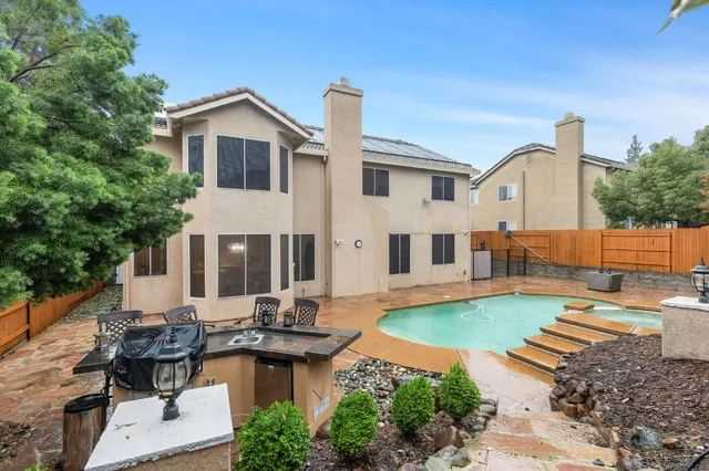 a view of a livingroom with furniture and hardwood floor