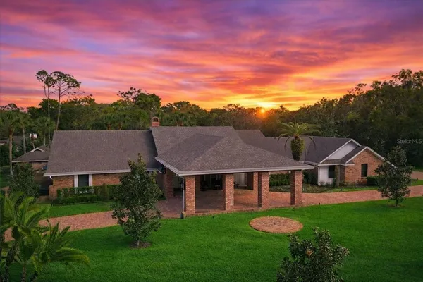 a aerial view of a house with garden