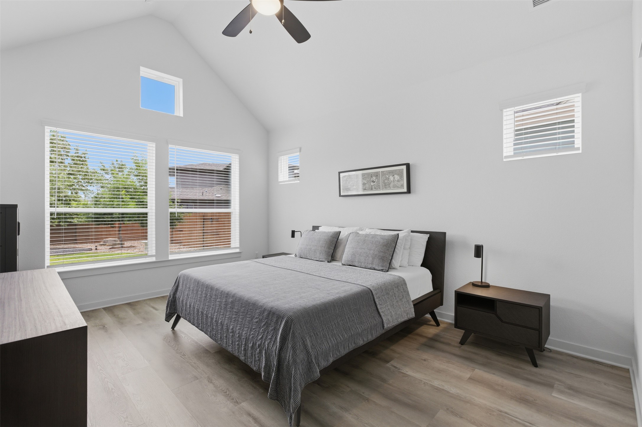 9001 Spire View Austin, TX 78744 - Photo 18 of 35 Vaulted ceilings in the primary bedroom off the main floor
