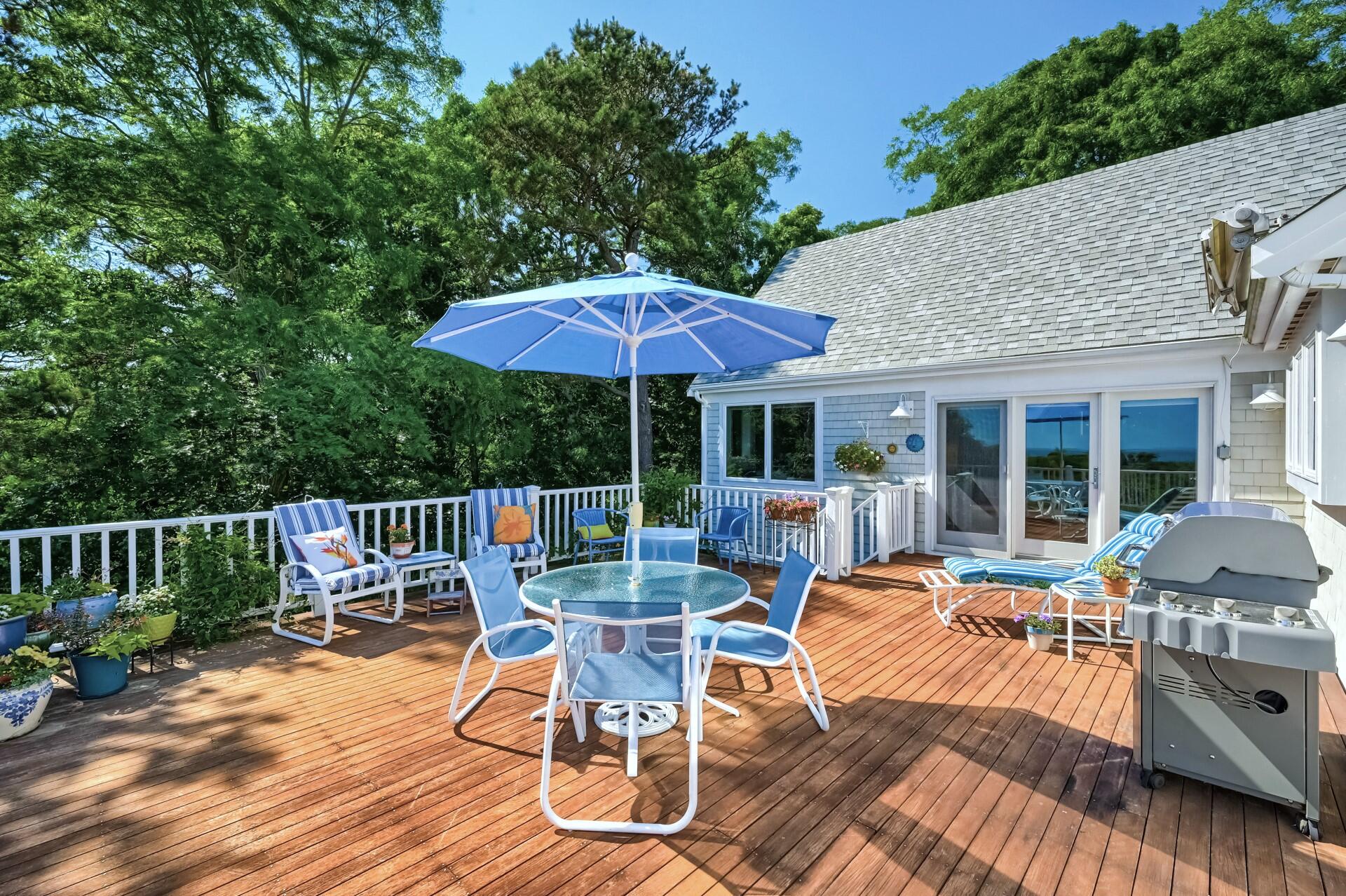 95 Chequessett Neck Road Wellfleet, MA 02667 - Photo 15 of 75 a view of house with patio outdoor seating