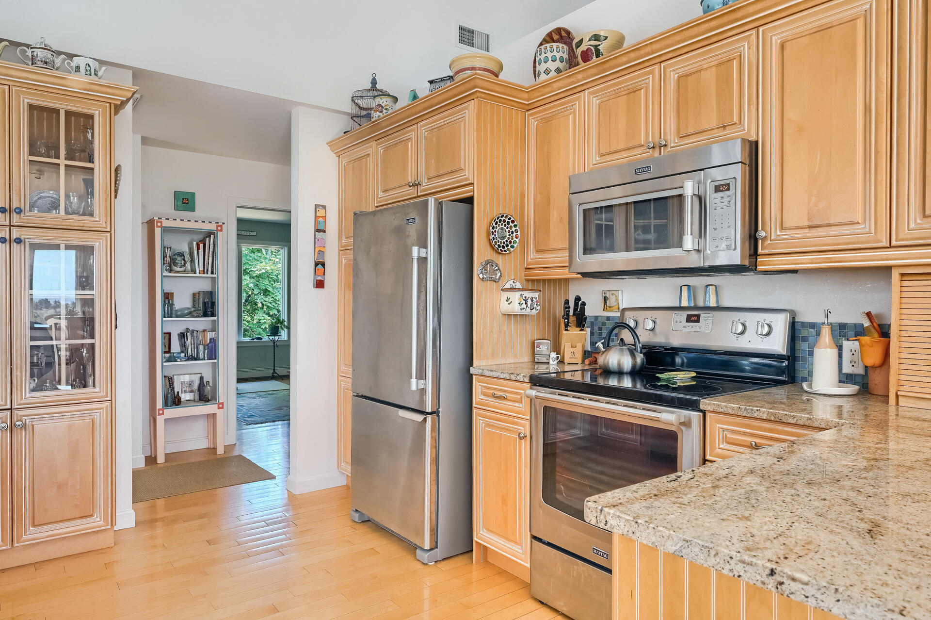 95 Chequessett Neck Road Wellfleet, MA 02667 - Photo 24 of 75 a kitchen with stainless steel appliances granite countertop a refrigerator stove and sink