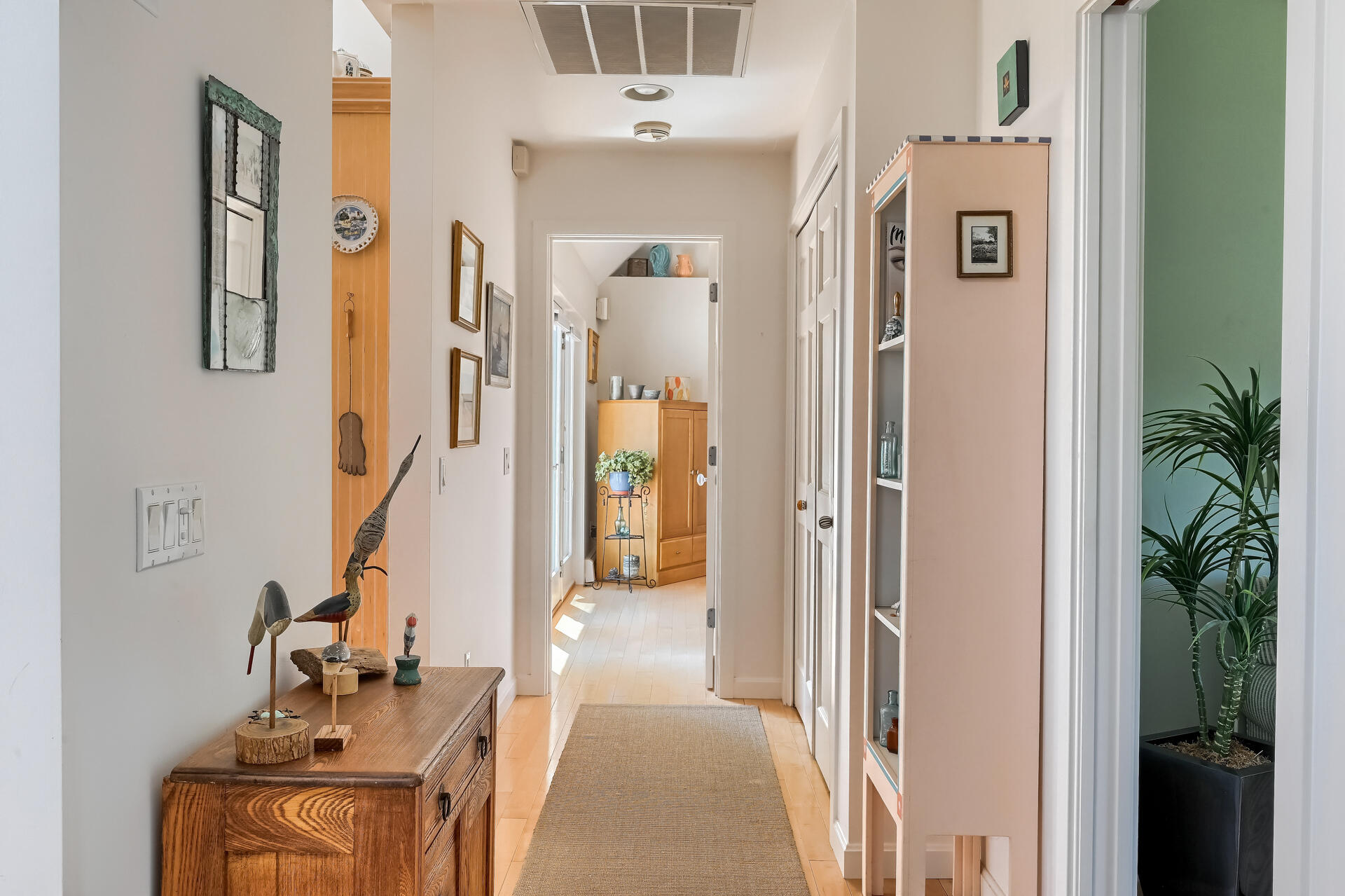 95 Chequessett Neck Road Wellfleet, MA 02667 - Photo 26 of 75 a view of a hallway with a livingroom and a bathroom with bathtub