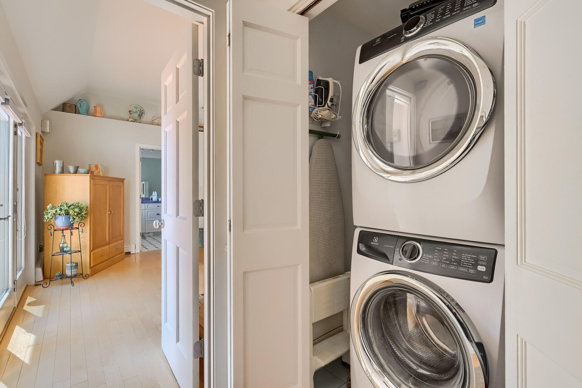 95 Chequessett Neck Road Wellfleet, MA 02667 - Photo 27 of 75 a view of a hallway with washer and dryer