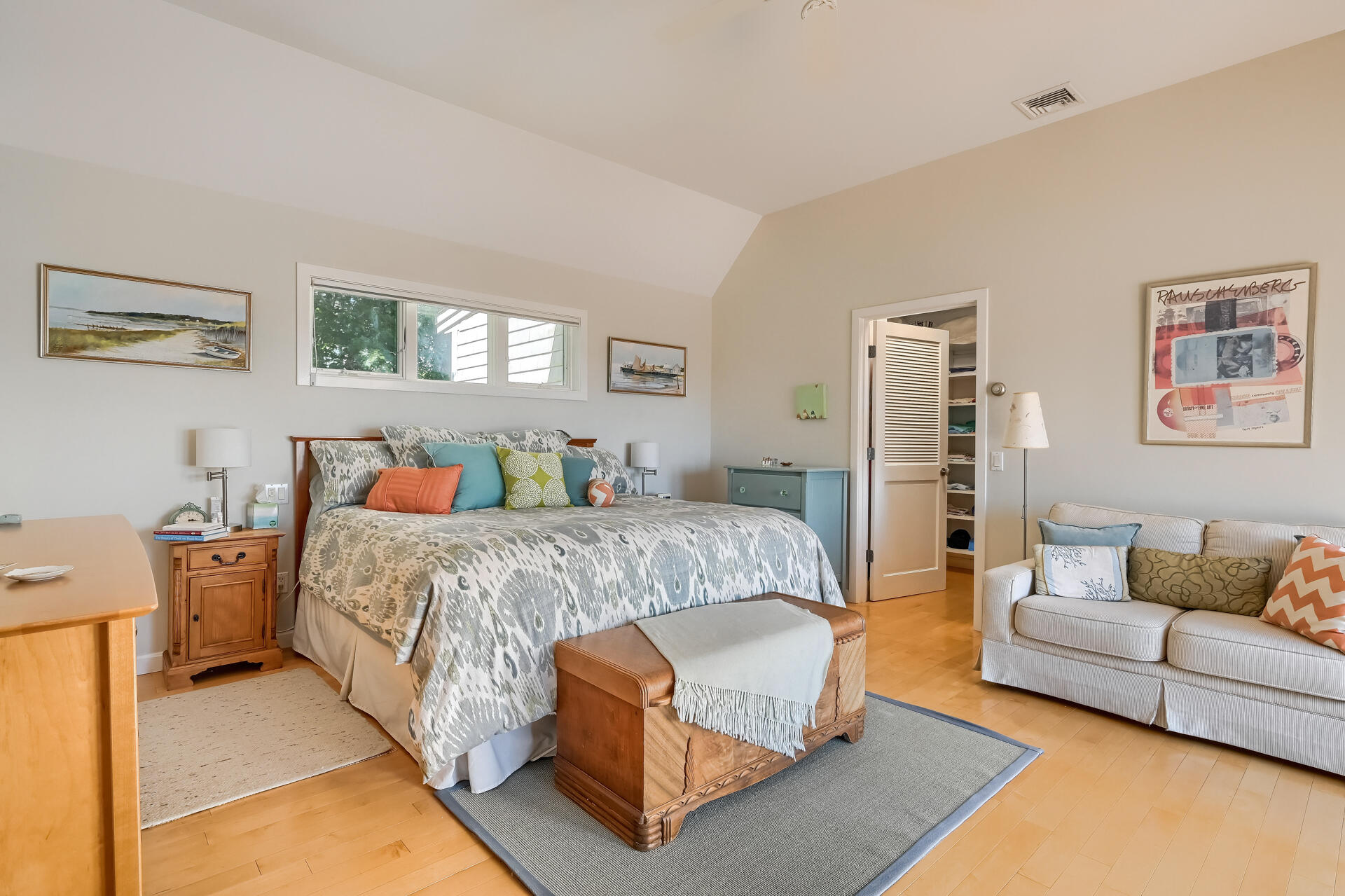 95 Chequessett Neck Road Wellfleet, MA 02667 - Photo 28 of 75 a bedroom with a bed couch and window