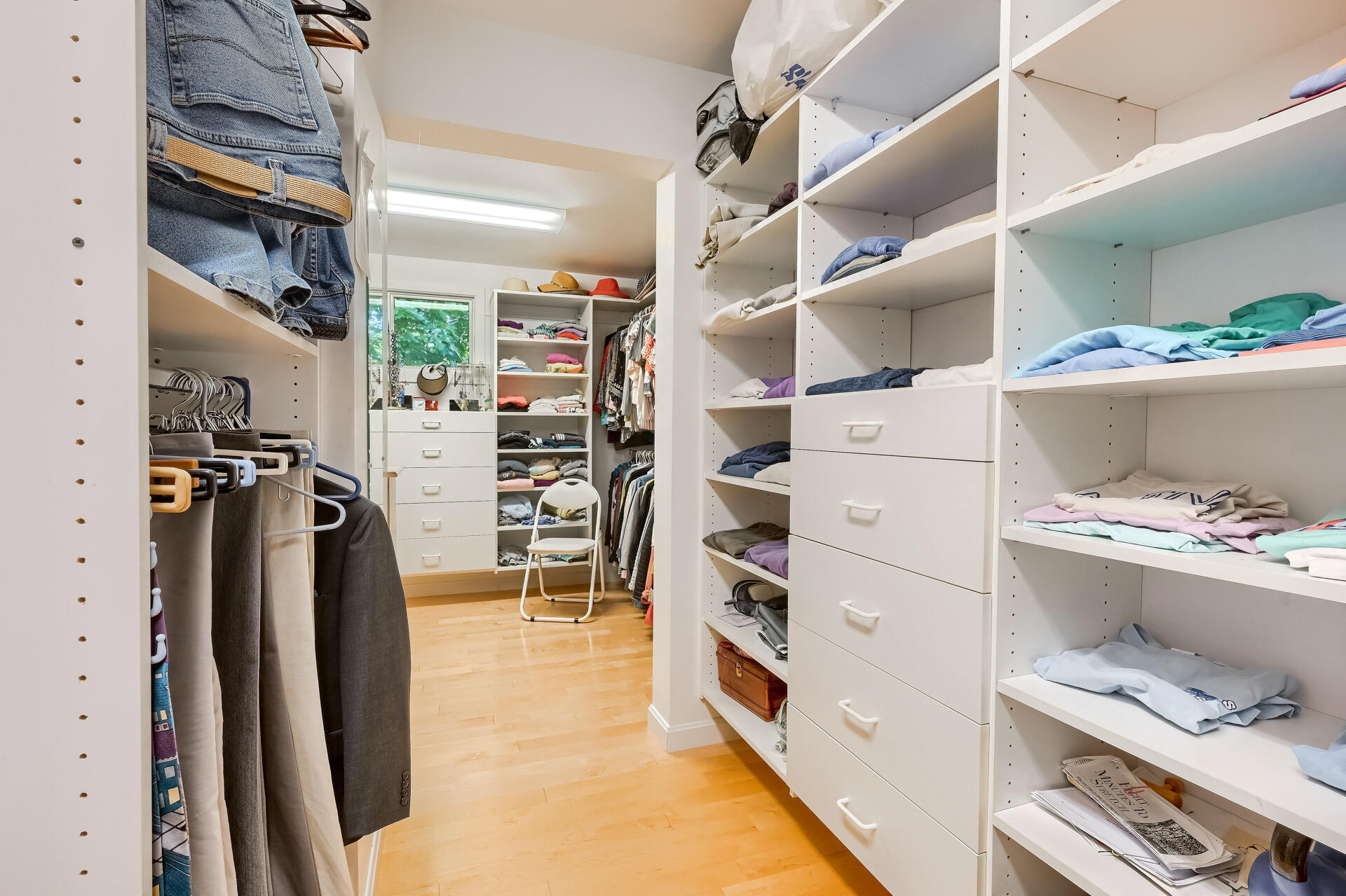 95 Chequessett Neck Road Wellfleet, MA 02667 - Photo 33 of 75 a view of walk in closet with clothes and shoes